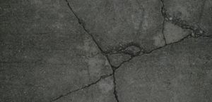 Close up photo of cracked cement