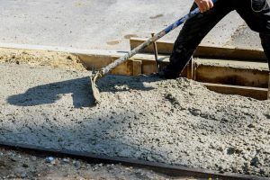Deploy high-quality Ohio Concrete Accelerators from Great Lakes Chloride image shows concrete being laid