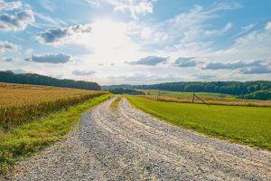 Tackle Ohio Gravel Road Maintenance with help from Great Lakes Chloride image shows country road