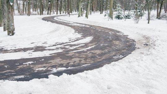 Tackle winter road management with Michigan Pre-Wetting Salt from Great Lakes Chloride image shows road cleared of snow